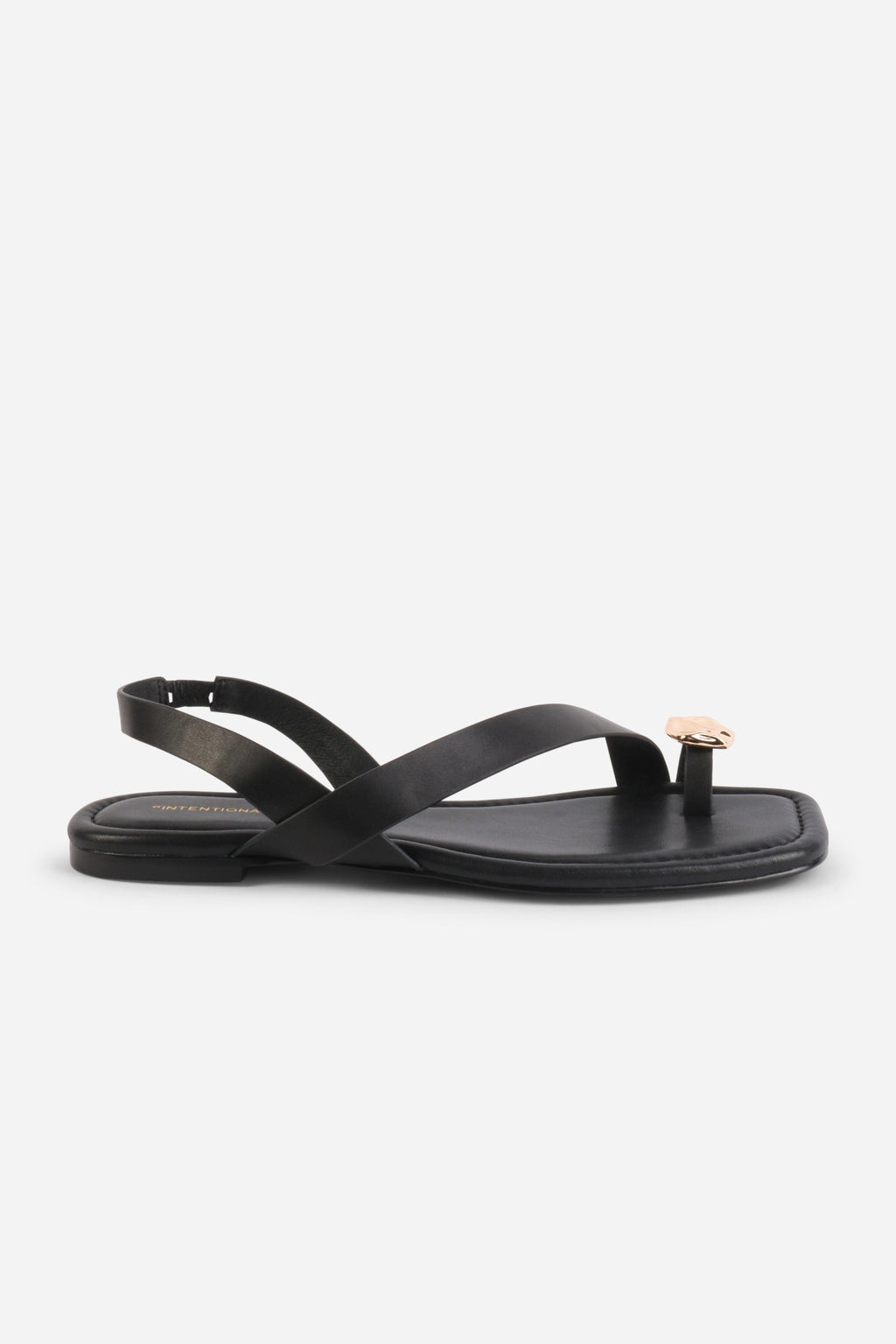 INTENTIONALLY __________. Roro Toe Ring Slingback Flat Sandal