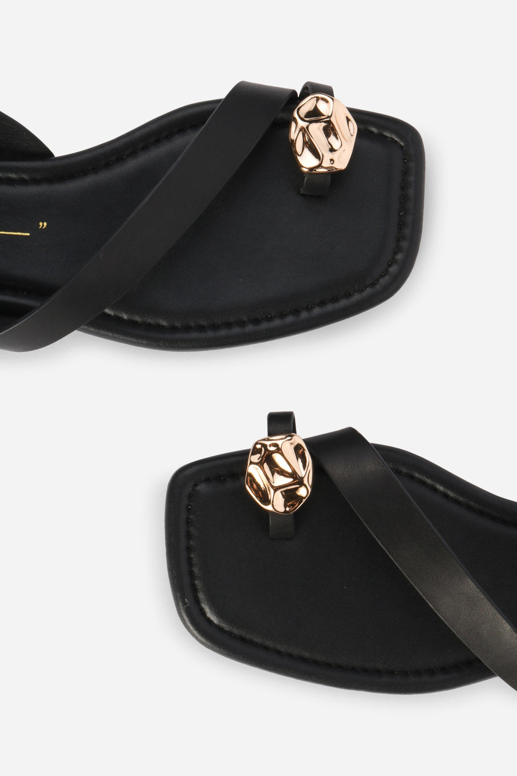 INTENTIONALLY __________. Roro Toe Ring Slingback Flat Sandal