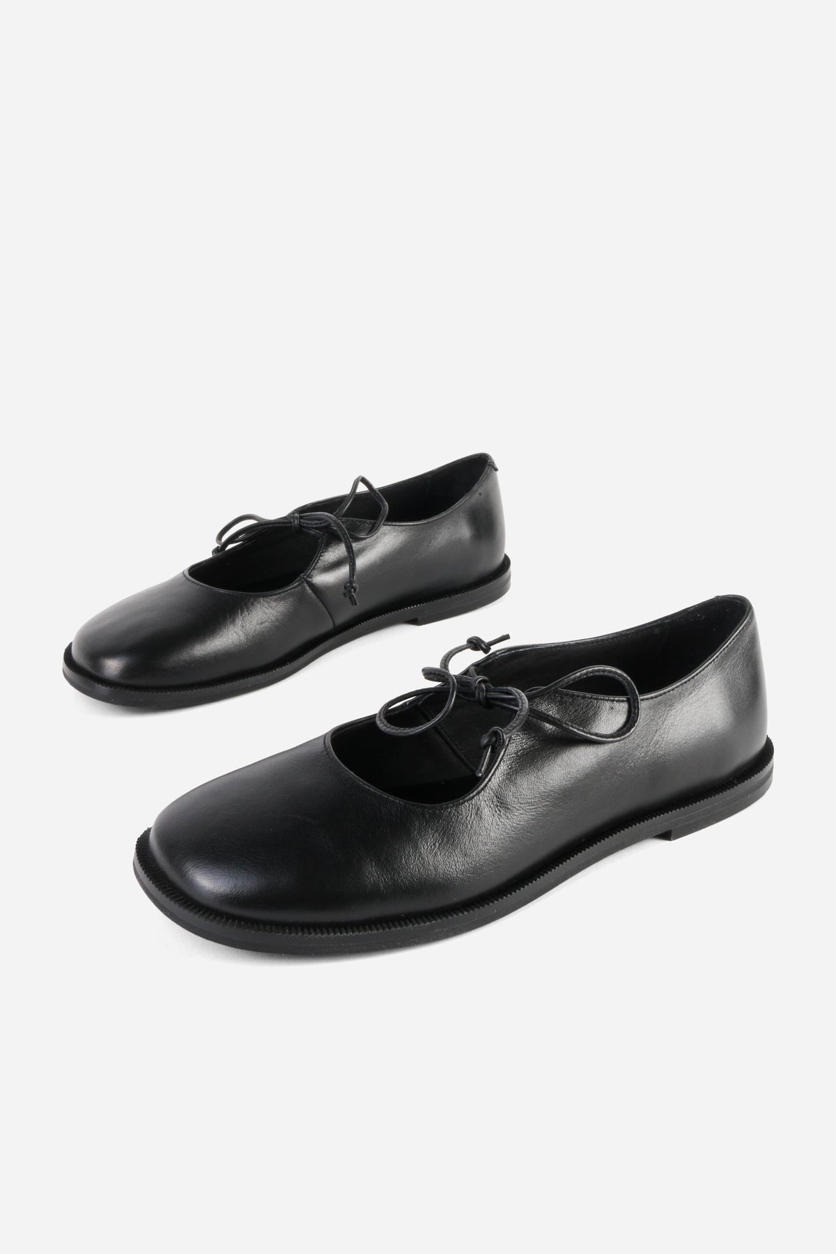 "INTENTIONALLY __________." Spaces Lace-Up Mary Jane Flat - Black