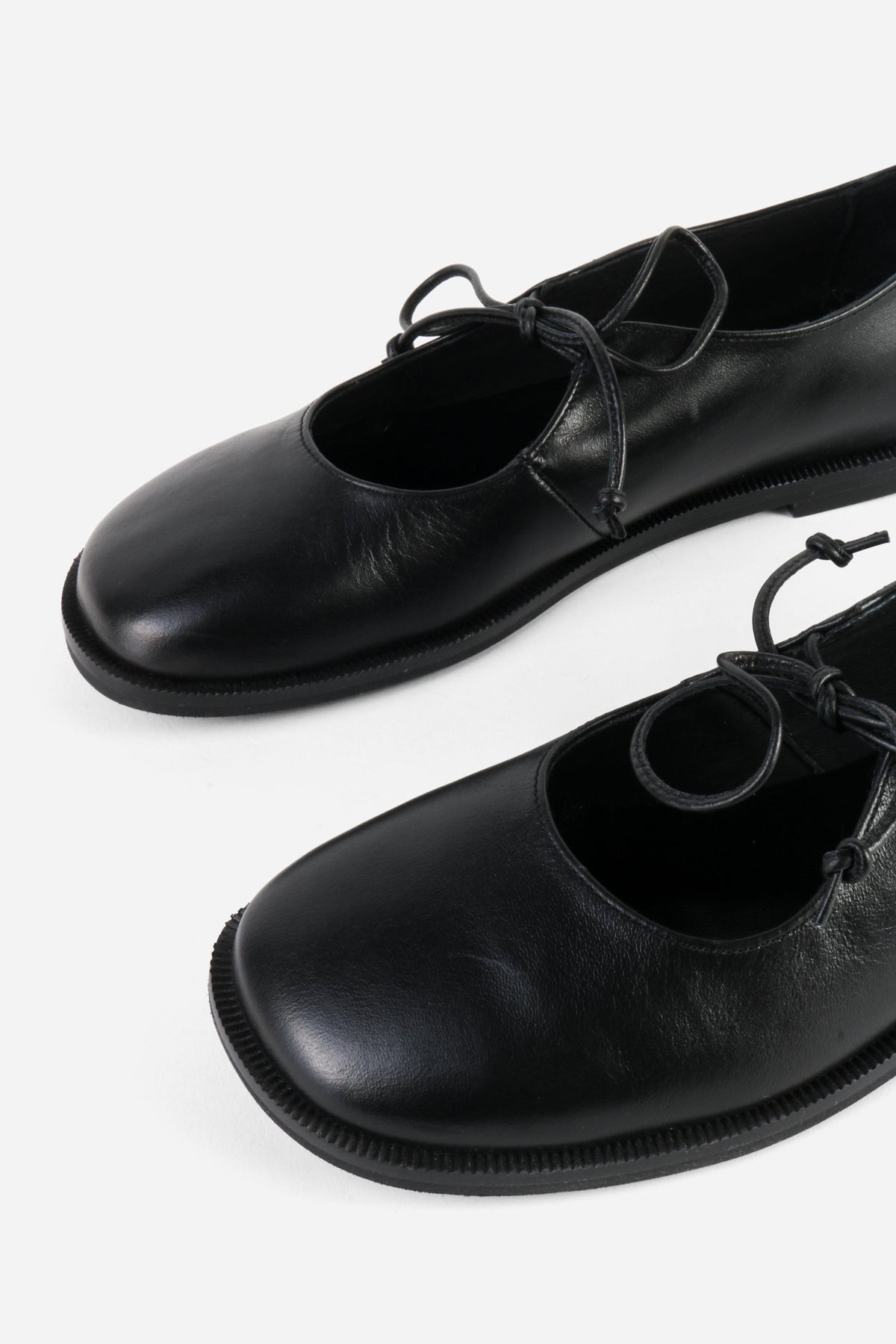 "INTENTIONALLY __________." Spaces Lace-Up Mary Jane Flat - Black