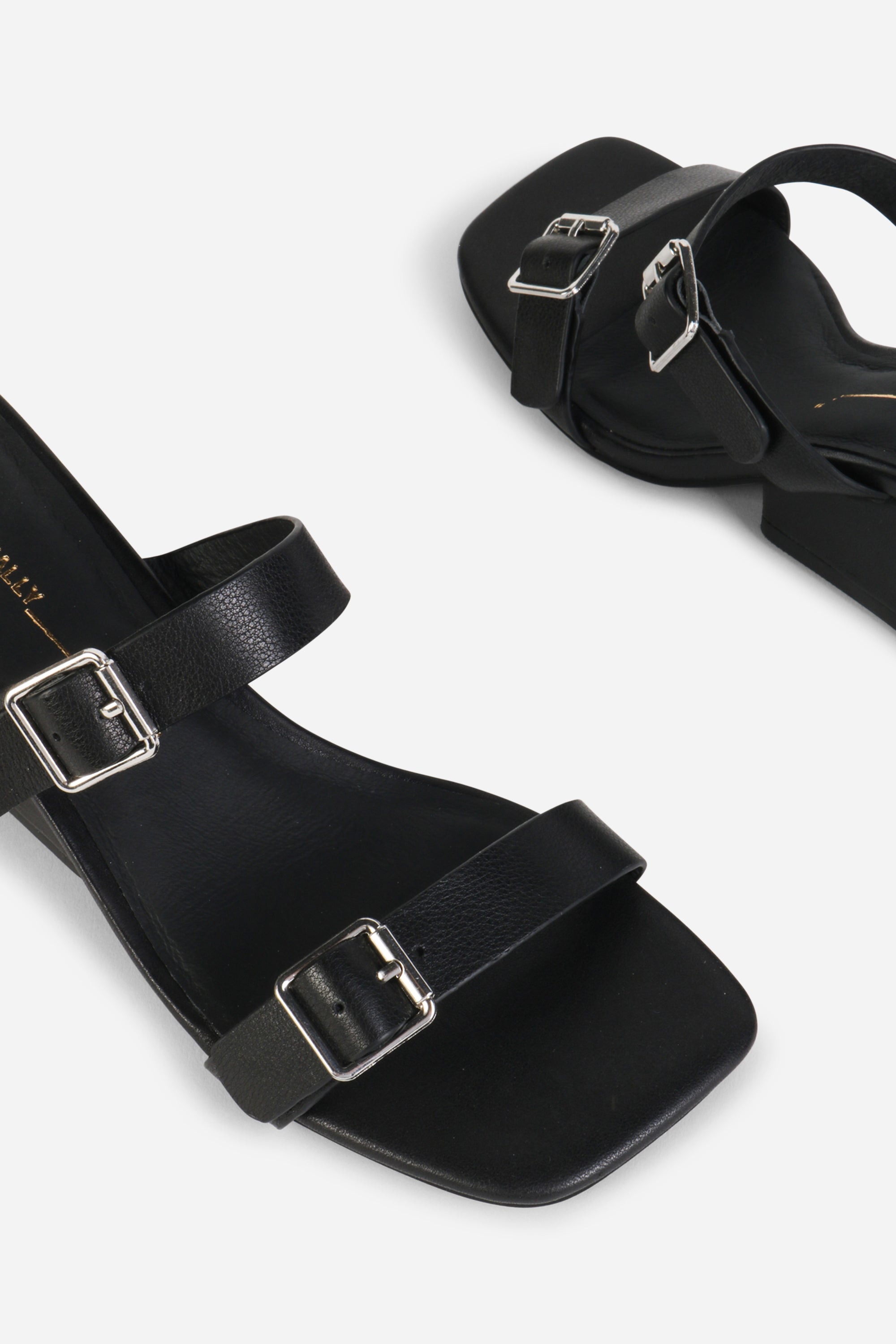 INTENTIONALLY __________. Surrender Leather Wedge Heel Sandals