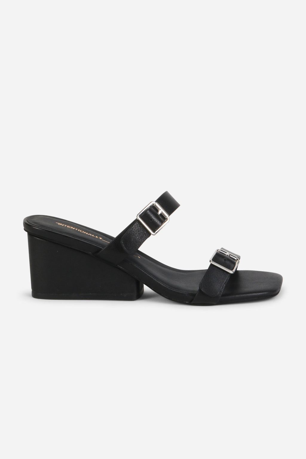 INTENTIONALLY __________. Surrender Leather Wedge Heel Sandals