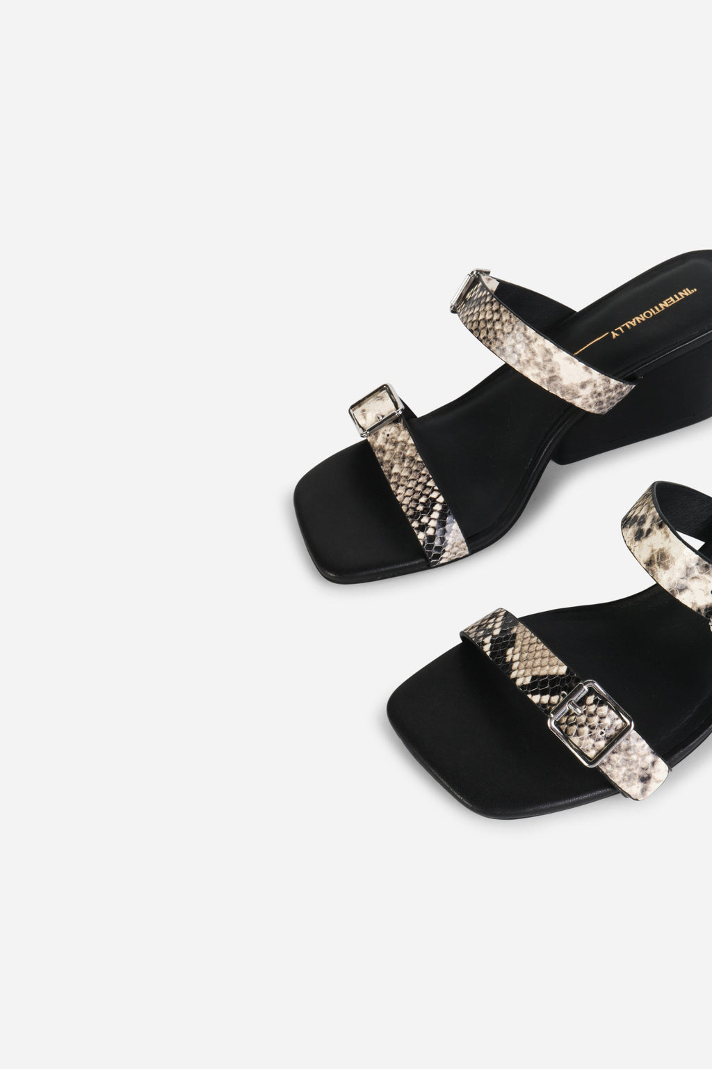 INTENTIONALLY __________. Surrender Snake Embossed Wedge Heel Sandal - Black/White