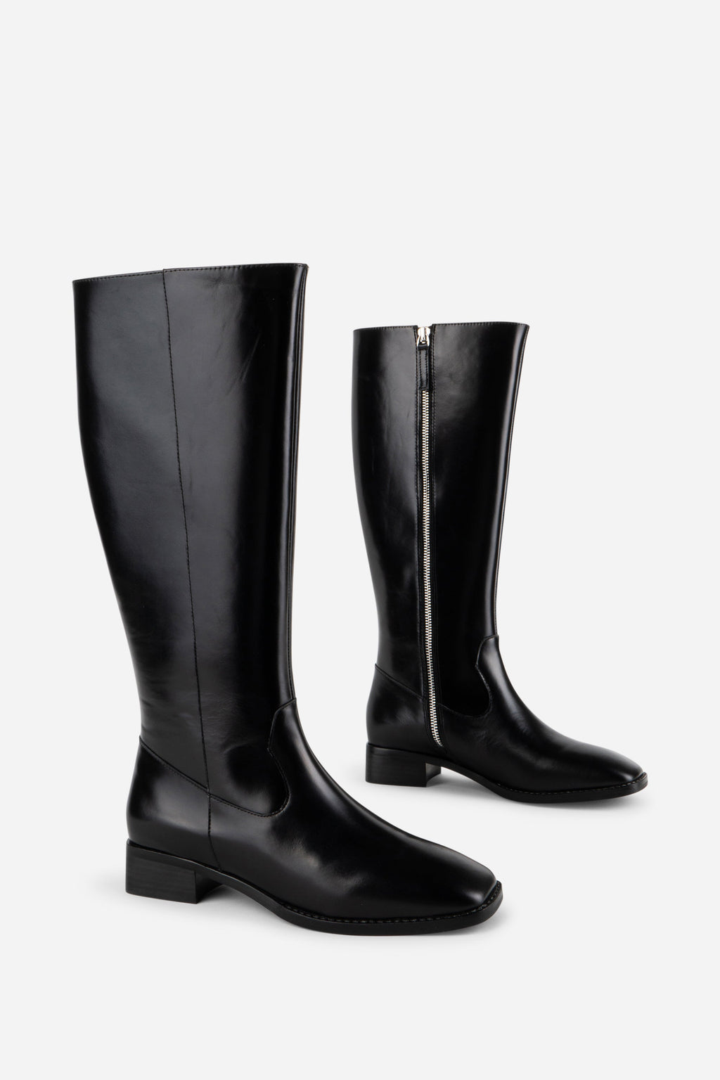 INTENTIONALLY __________. Tame Knee High Boot - Black