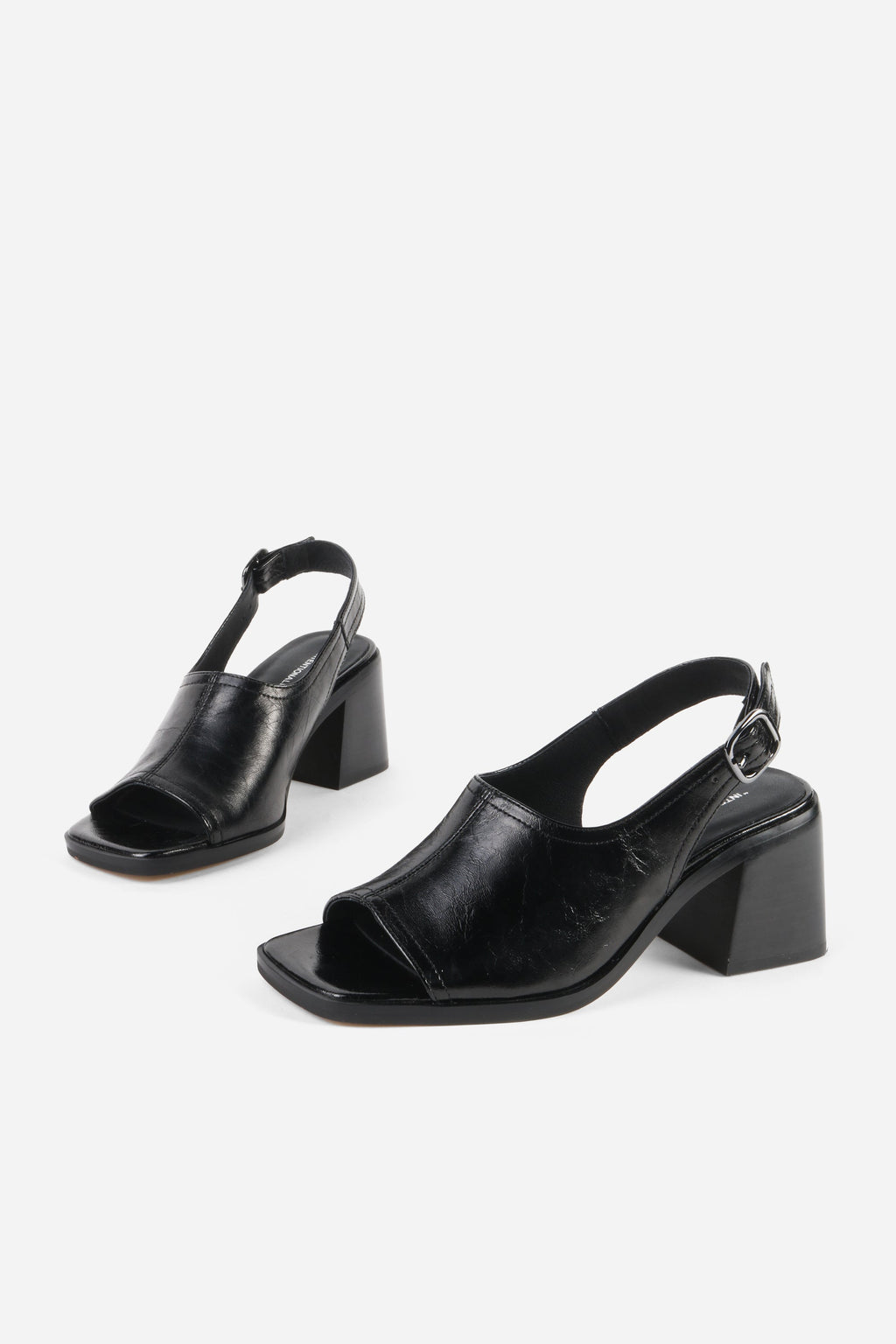 "INTENTIONALLY __________." Teresa Slingback Open Toe Block Heel
