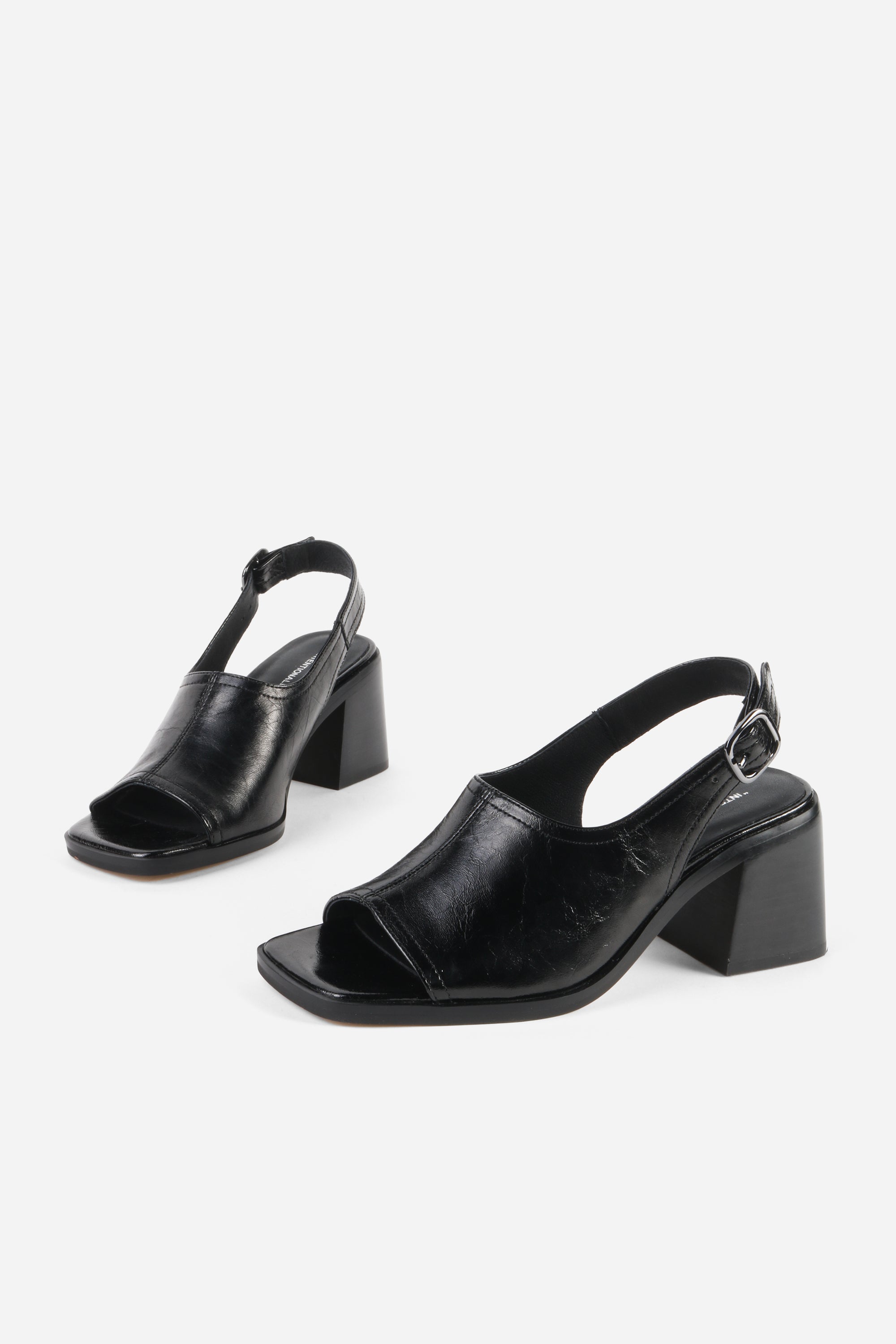 "INTENTIONALLY __________." Teresa Slingback Open Toe Block Heel
