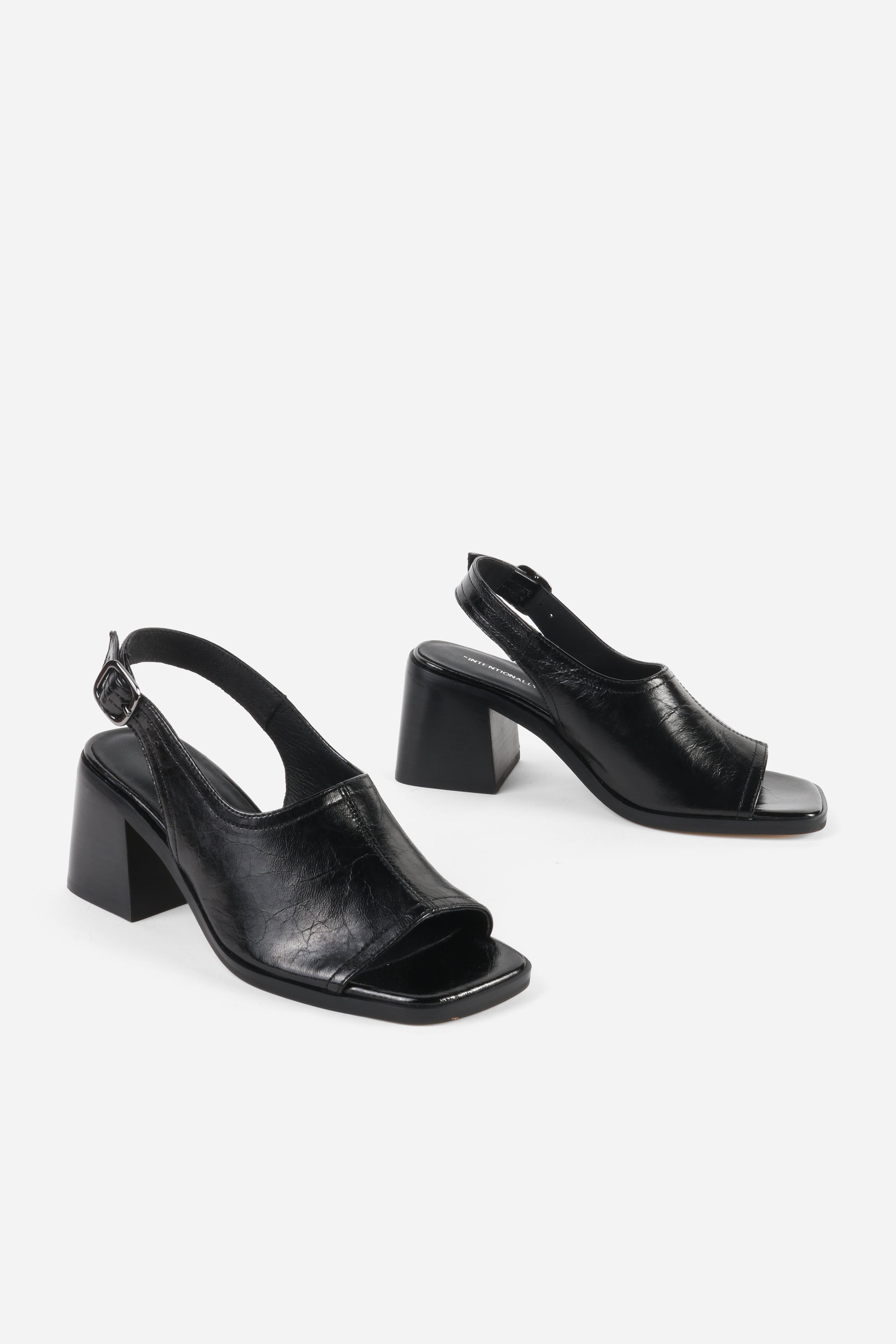 "INTENTIONALLY __________." Teresa Slingback Open Toe Block Heel