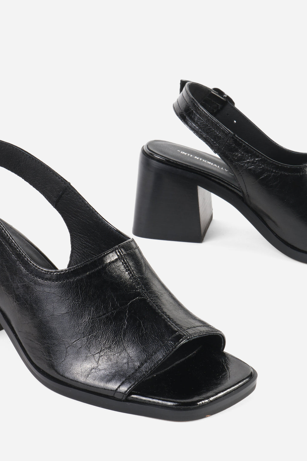 "INTENTIONALLY __________." Teresa Slingback Open Toe Block Heel