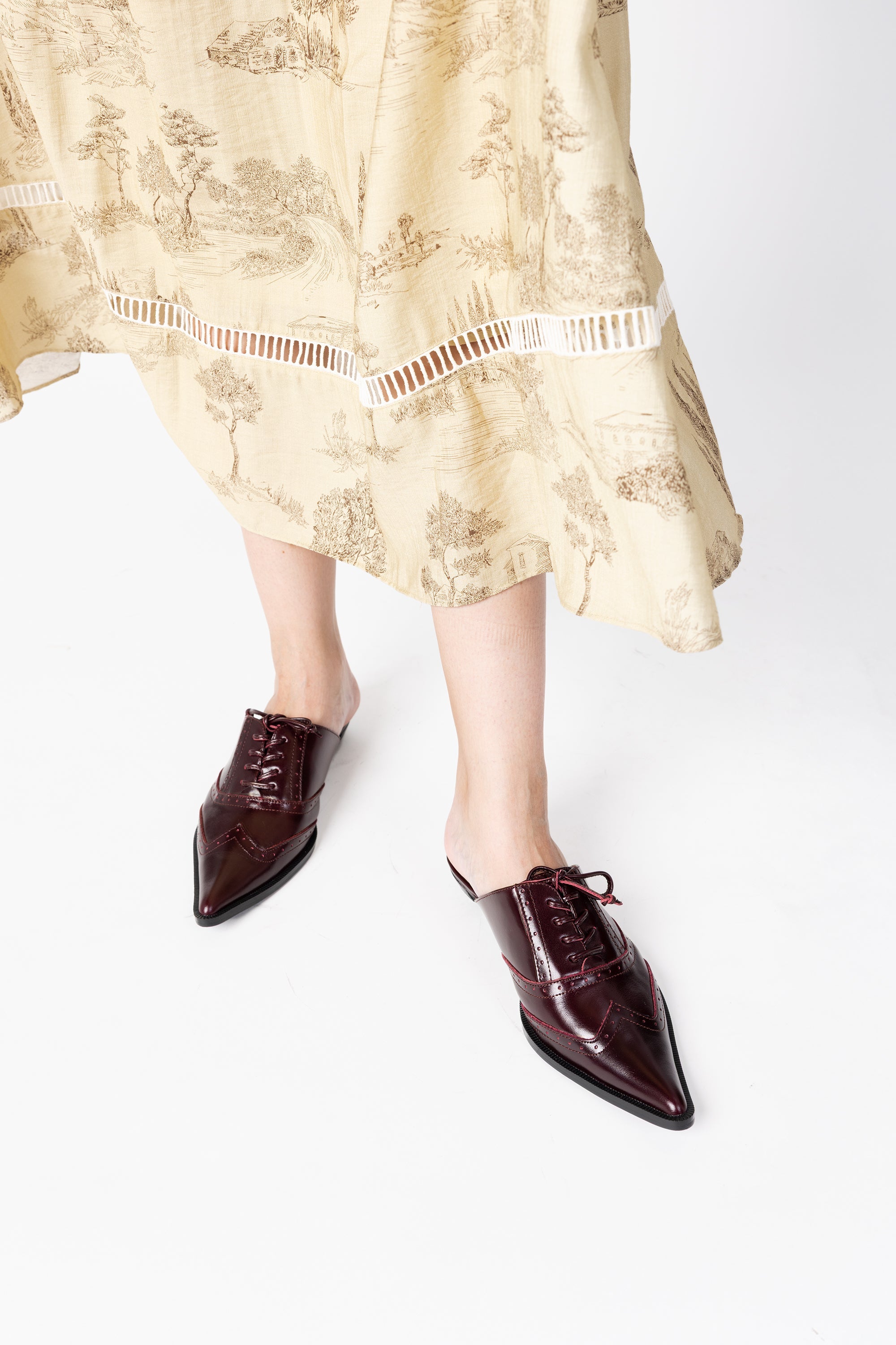INTENTIONALLY __________. Tonian Lace-Up Flat Mule