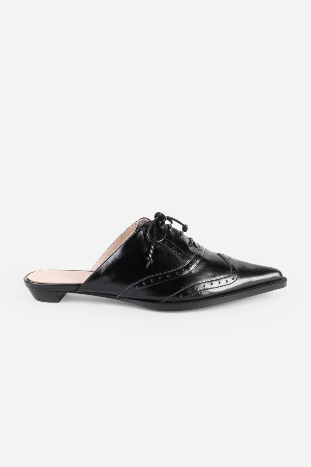 INTENTIONALLY __________. Tonian Lace-Up Flat Mule
