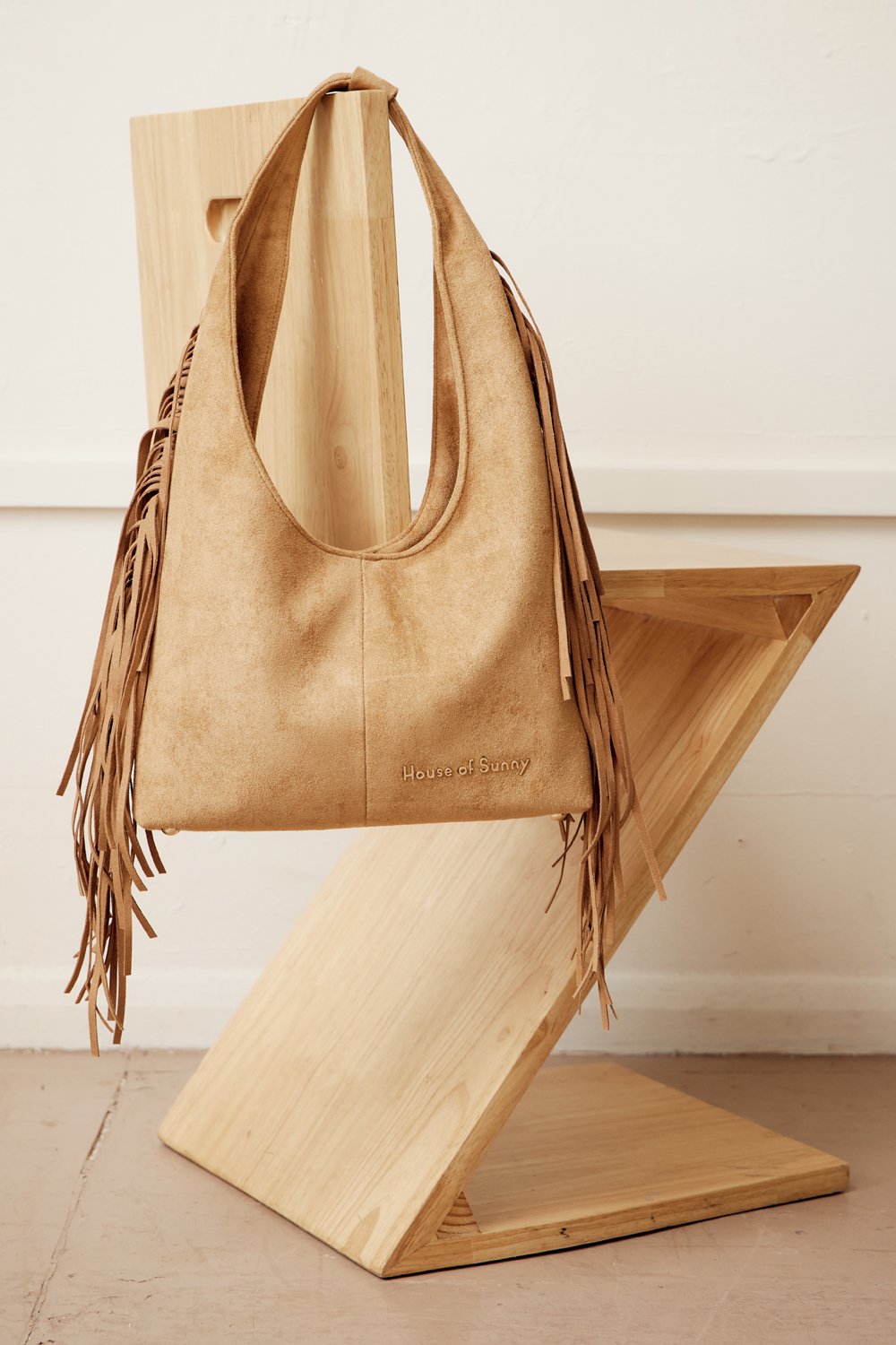 House of Sunny Tassel Sling Bag