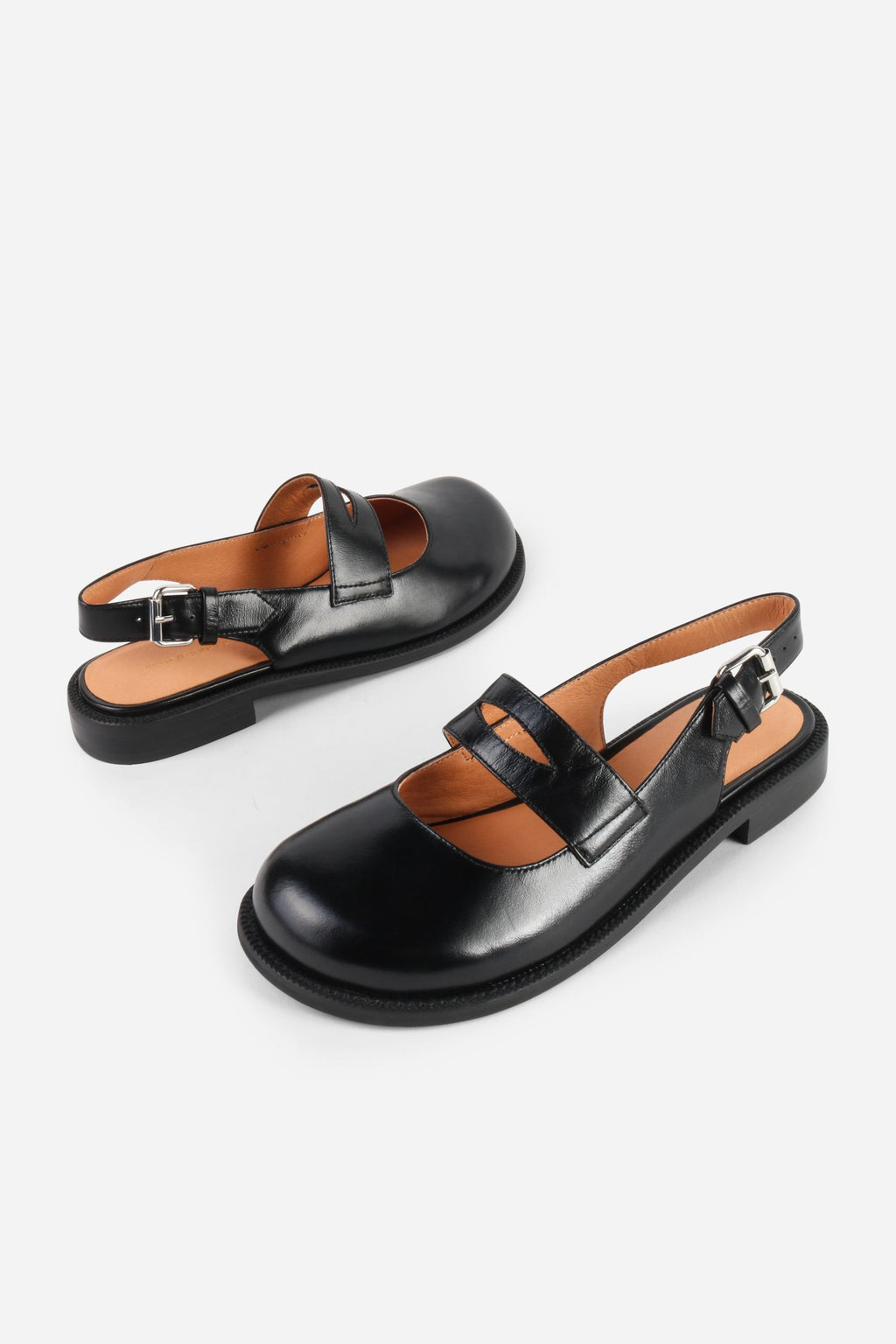INTENTIONALLY __________. Vented Chunky Slingback Maryjane Shoes