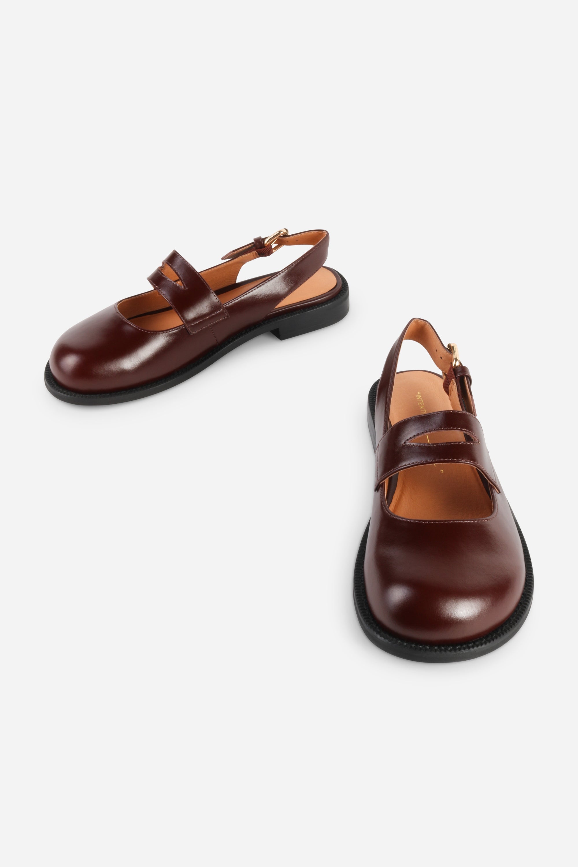 INTENTIONALLY __________. Vented Chunky Slingback Maryjane Shoes