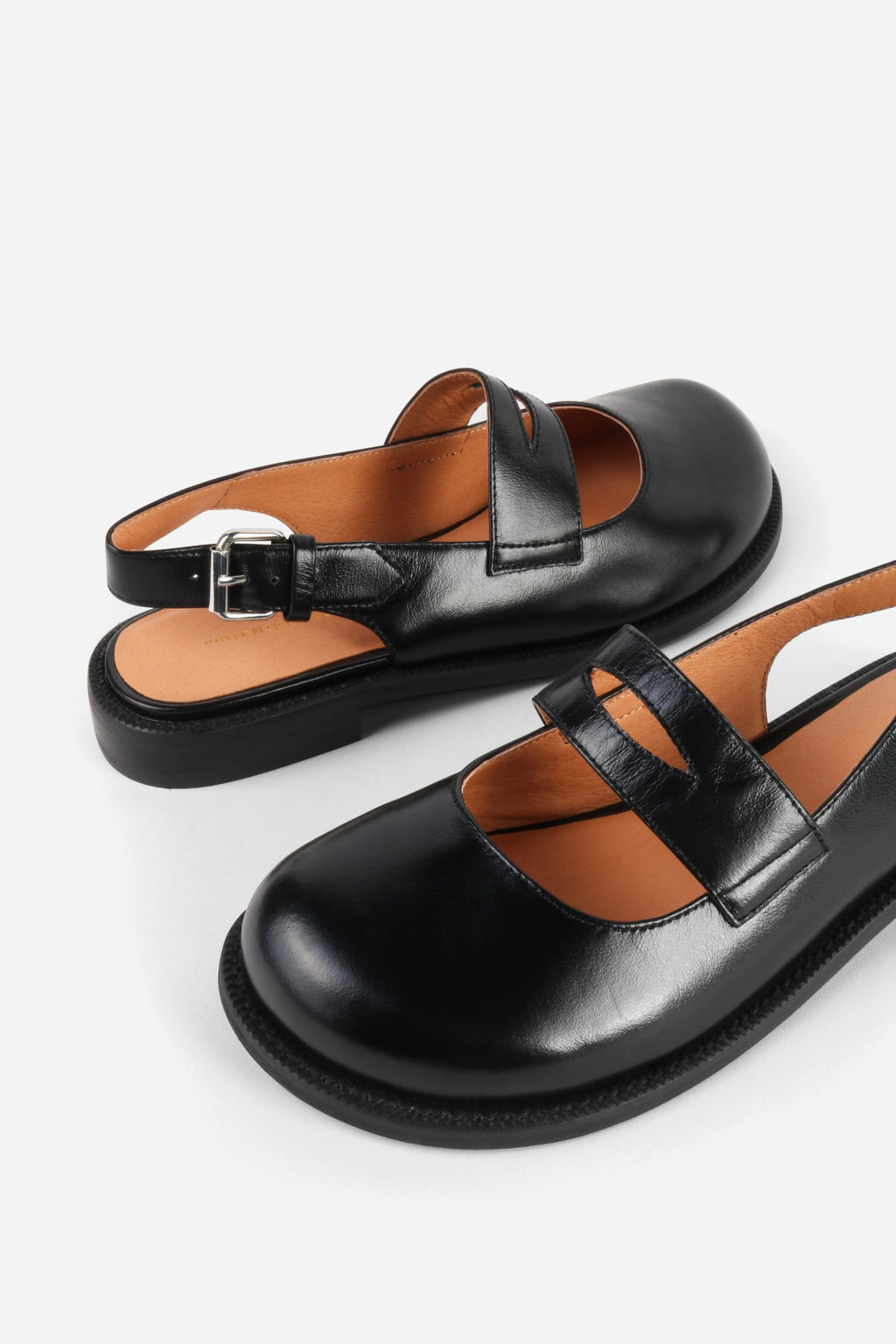 INTENTIONALLY __________. Vented Chunky Slingback Maryjane Shoes