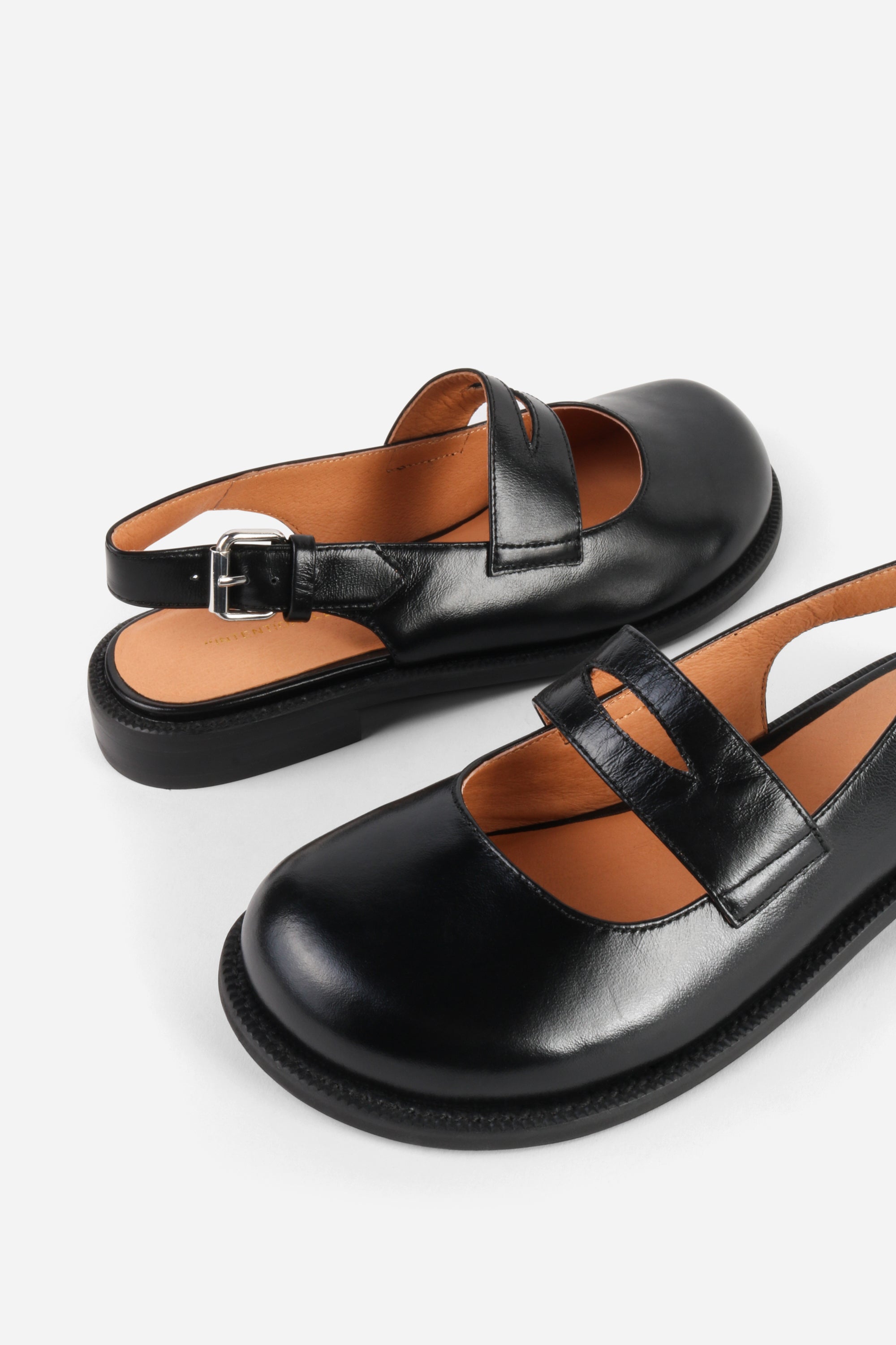 INTENTIONALLY __________. Vented Chunky Slingback Maryjane Shoes