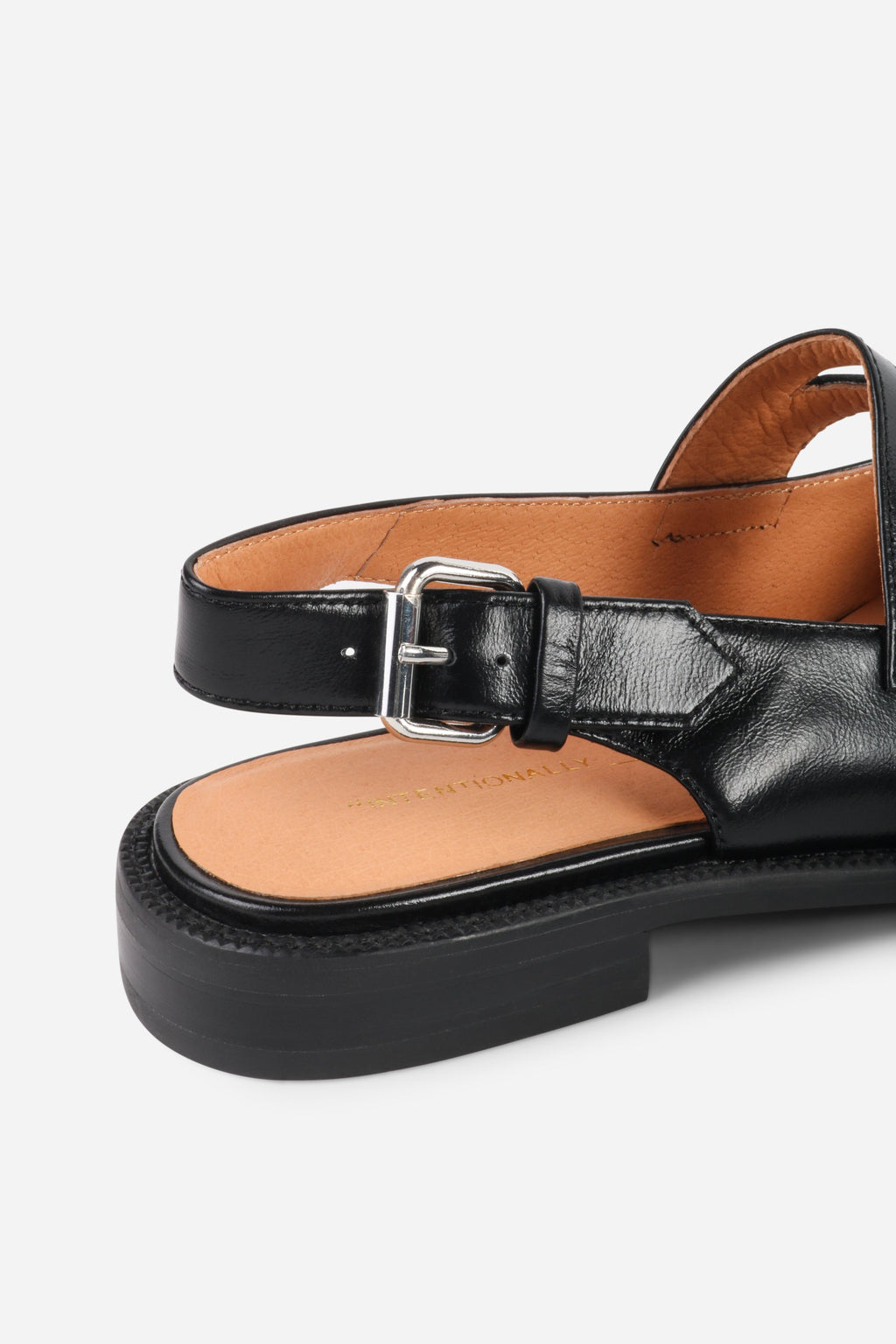 INTENTIONALLY __________. Vented Chunky Slingback Maryjane Shoes
