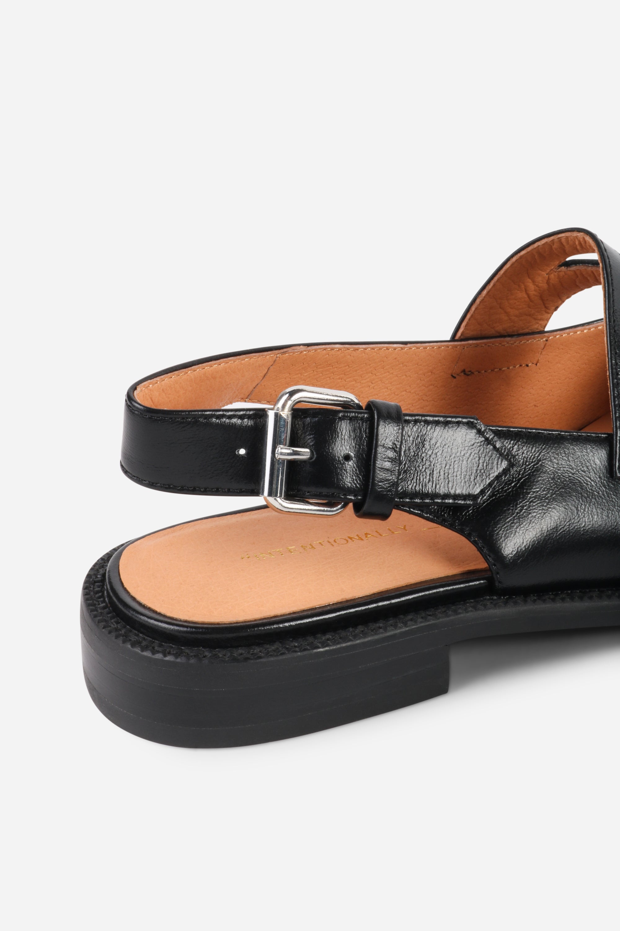 INTENTIONALLY __________. Vented Chunky Slingback Maryjane Shoes