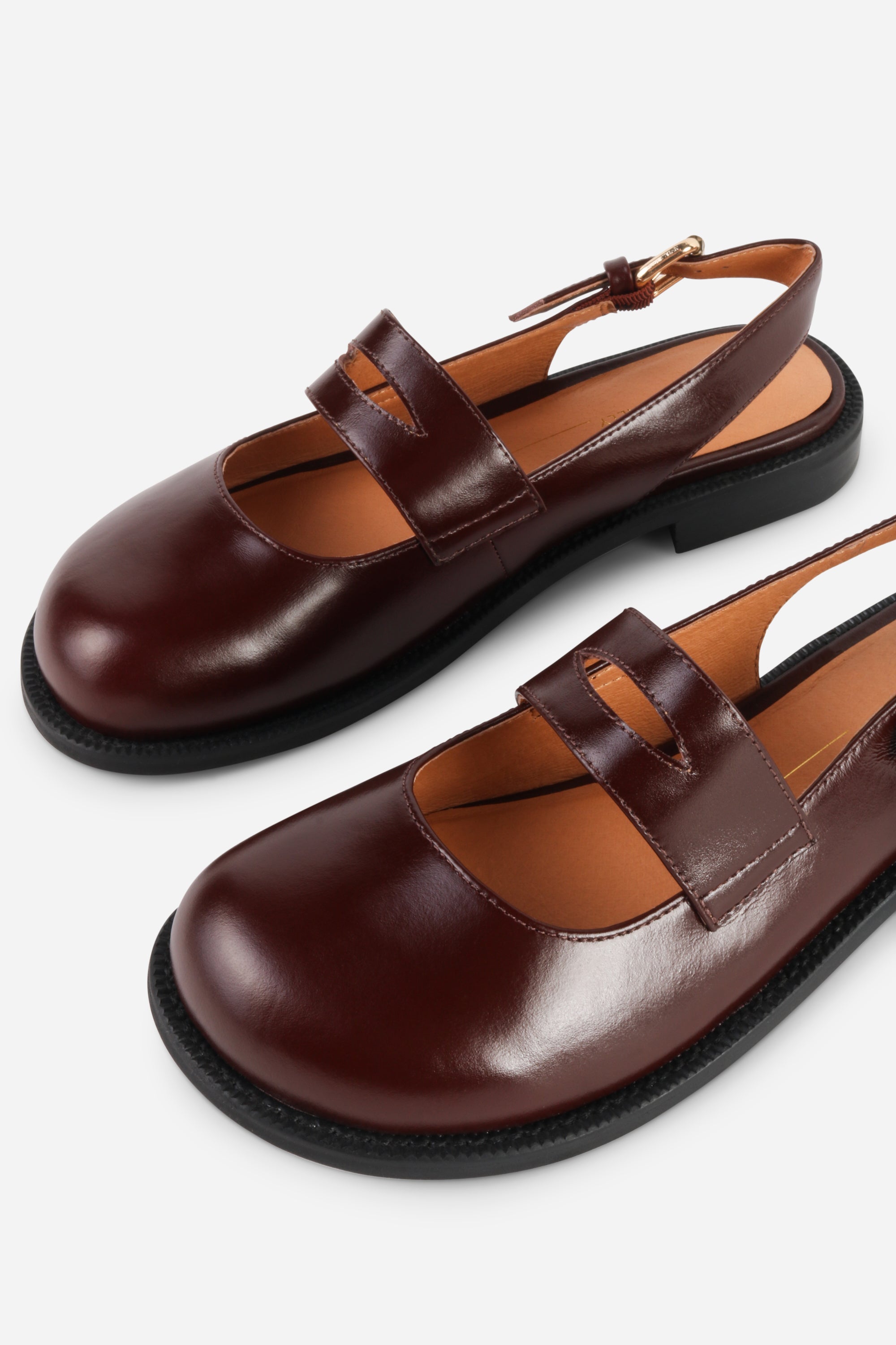 INTENTIONALLY __________. Vented Chunky Slingback Maryjane Shoes