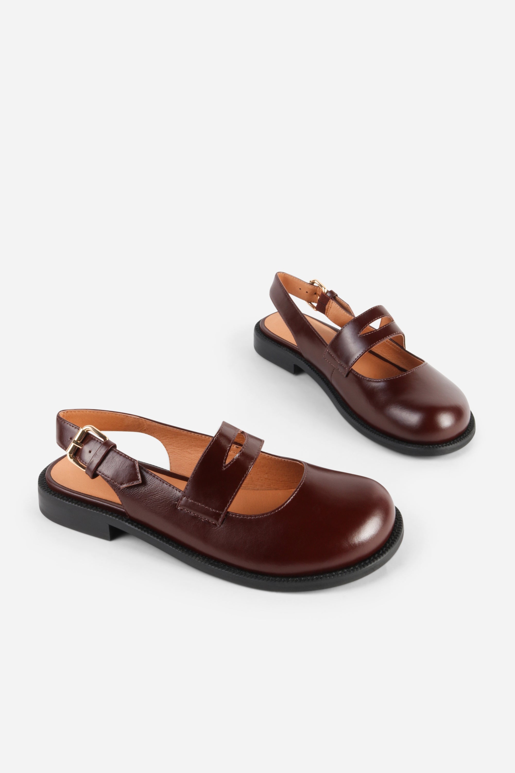 INTENTIONALLY __________. Vented Chunky Slingback Maryjane Shoes