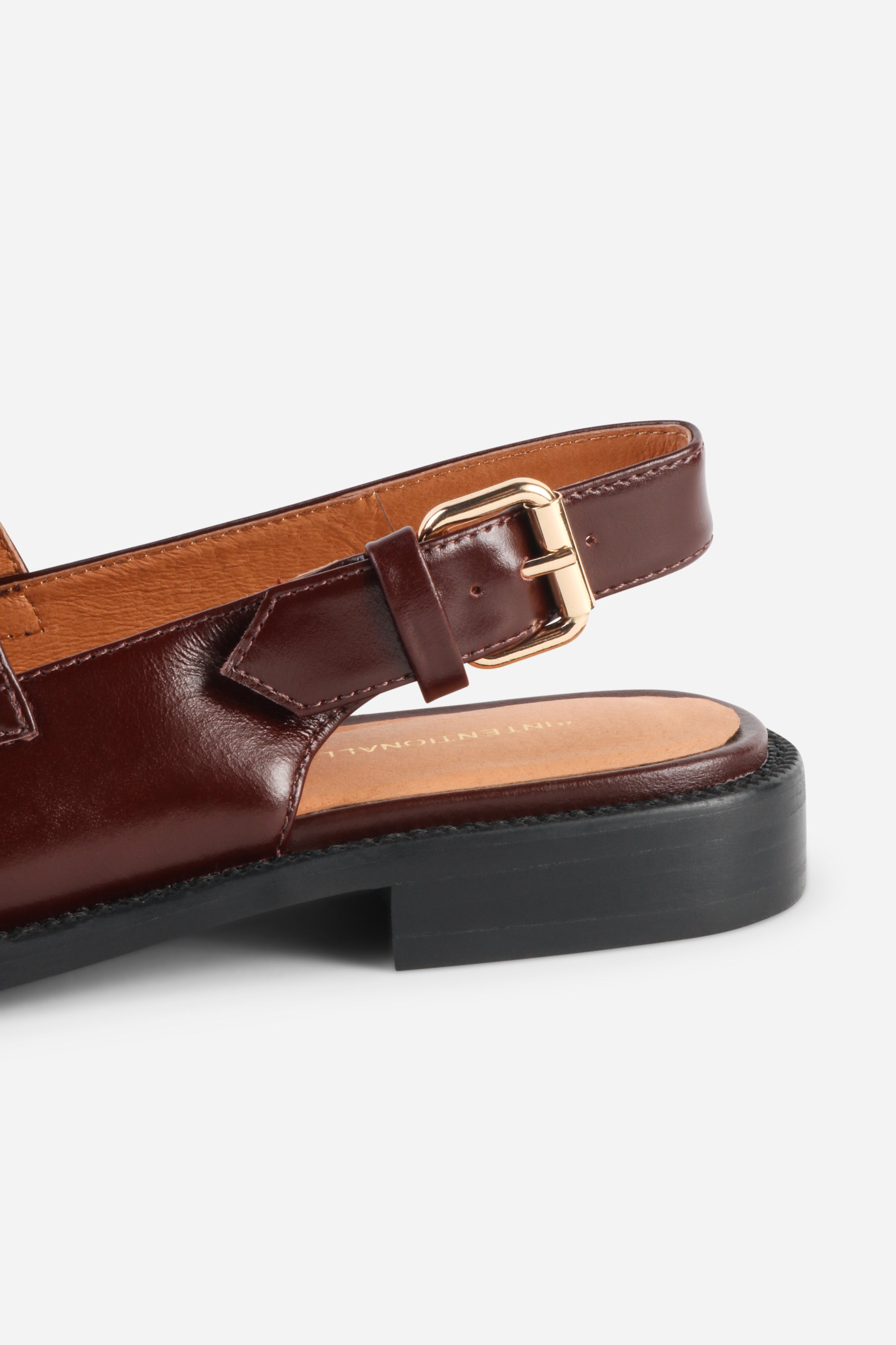 INTENTIONALLY __________. Vented Chunky Slingback Maryjane Shoes