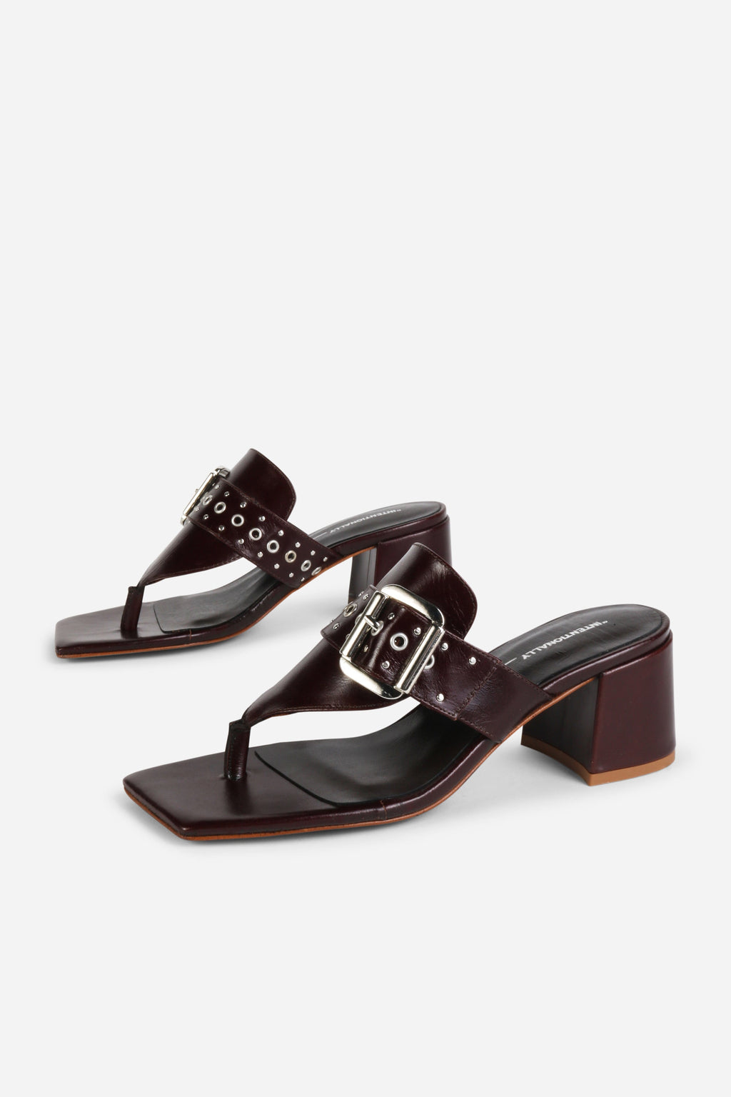 INTENTIONALLY __________. Wynona Thong Mule Heel