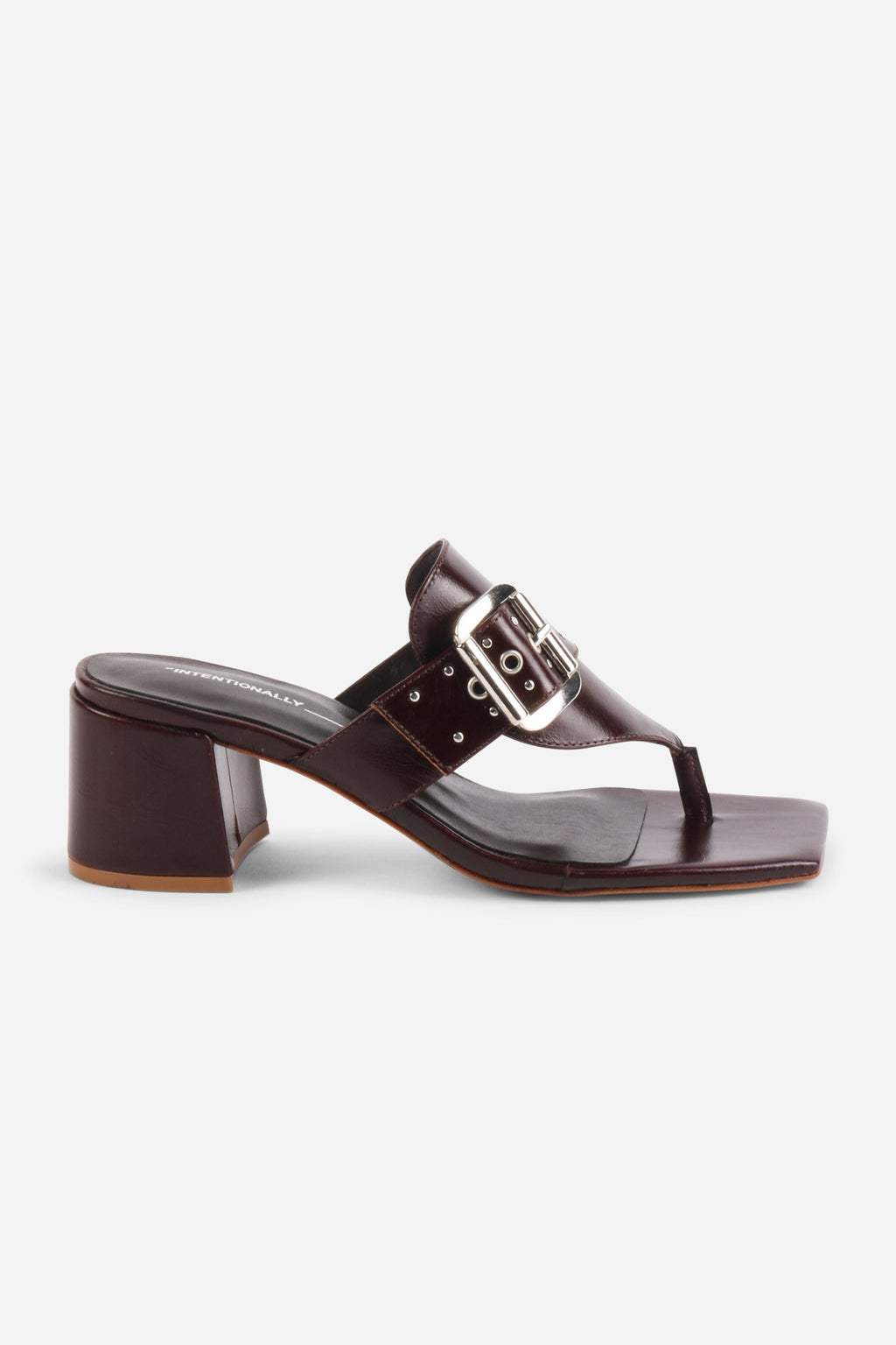 INTENTIONALLY __________. Wynona Thong Mule Heel