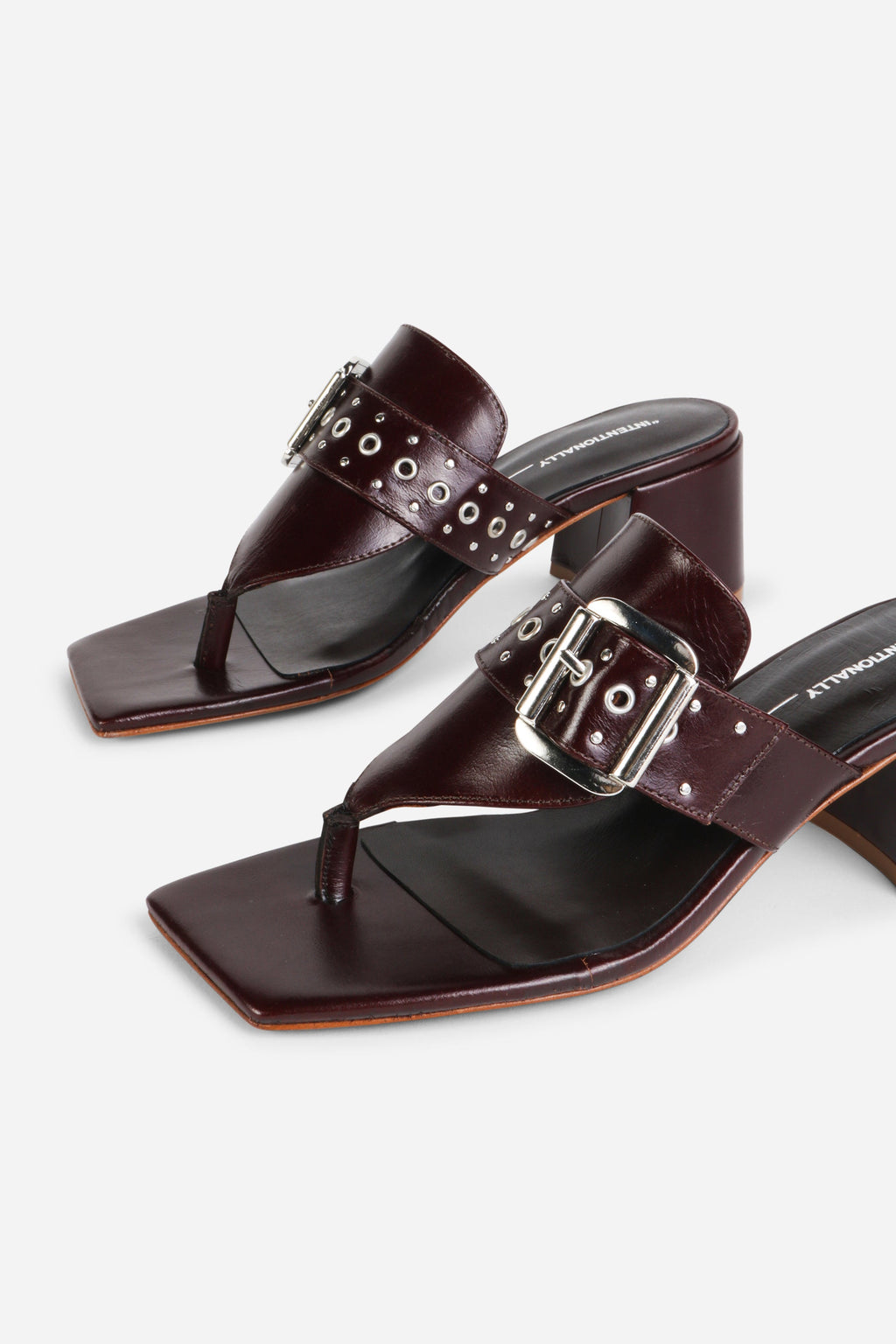 INTENTIONALLY __________. Wynona Thong Mule Heel