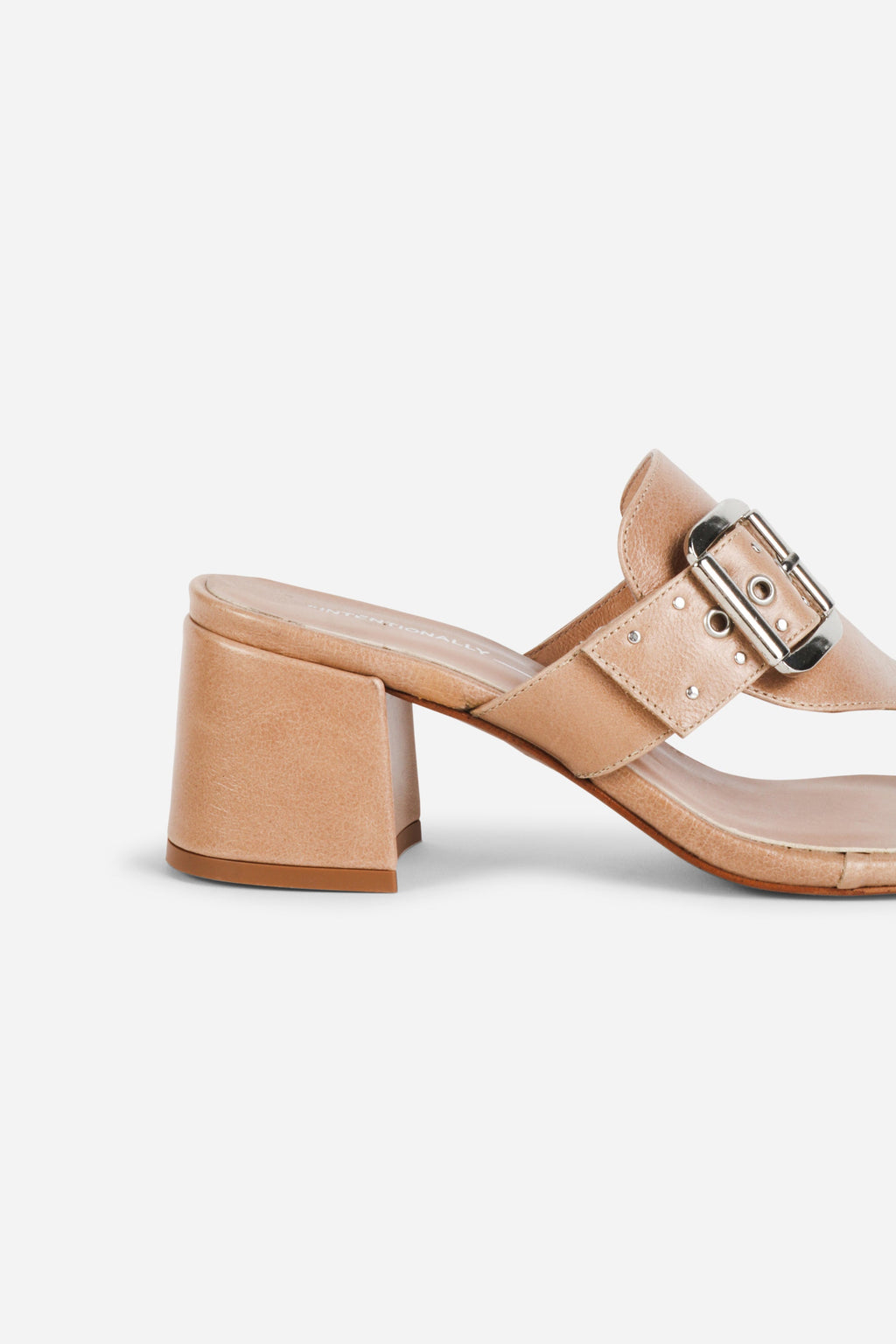 INTENTIONALLY __________. Wynona Thong Mule Heel