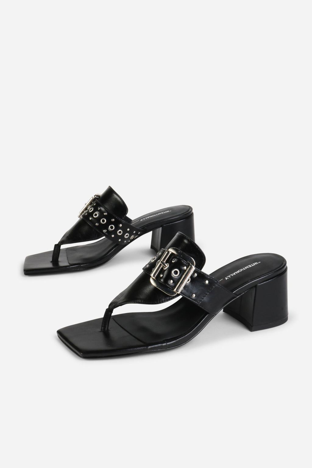 INTENTIONALLY __________. Wynona Thong Mule Heel