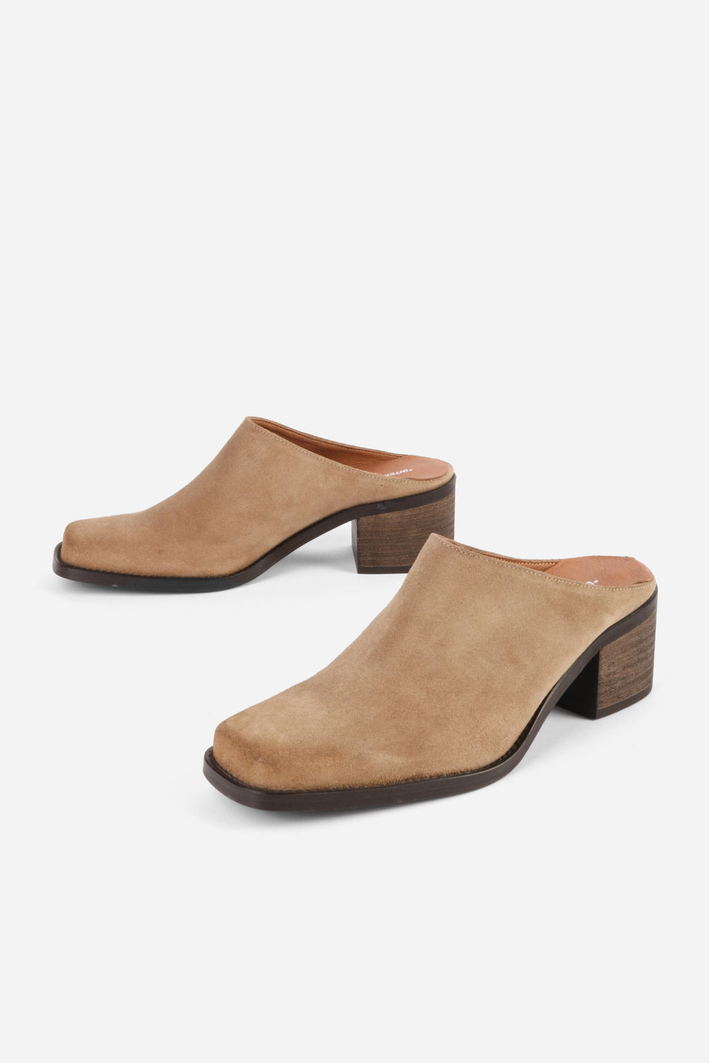 "INTENTIONALLY __________." Zelda Suede Heeled Mule