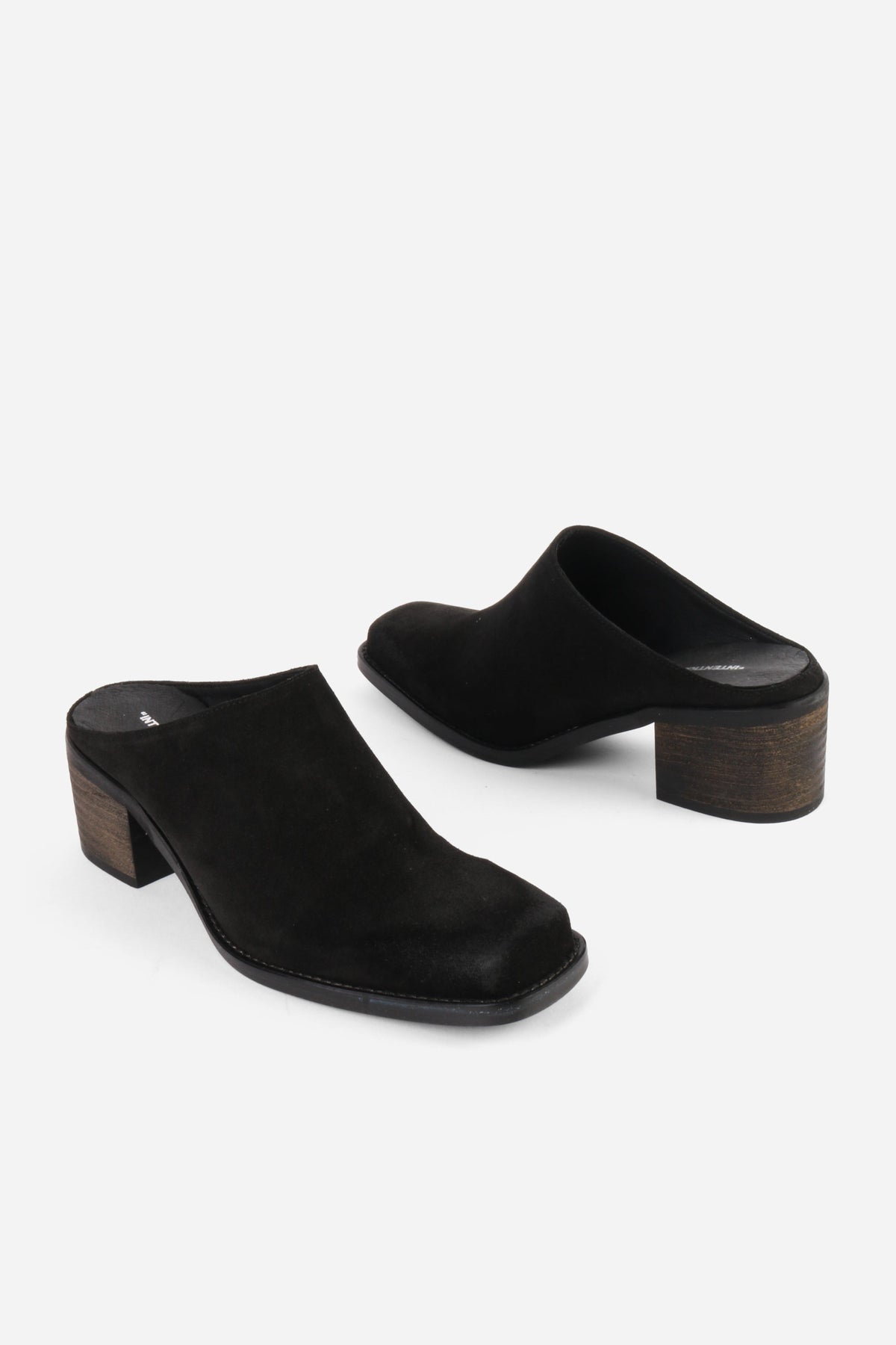 "INTENTIONALLY __________." Zelda Suede Heeled Mule