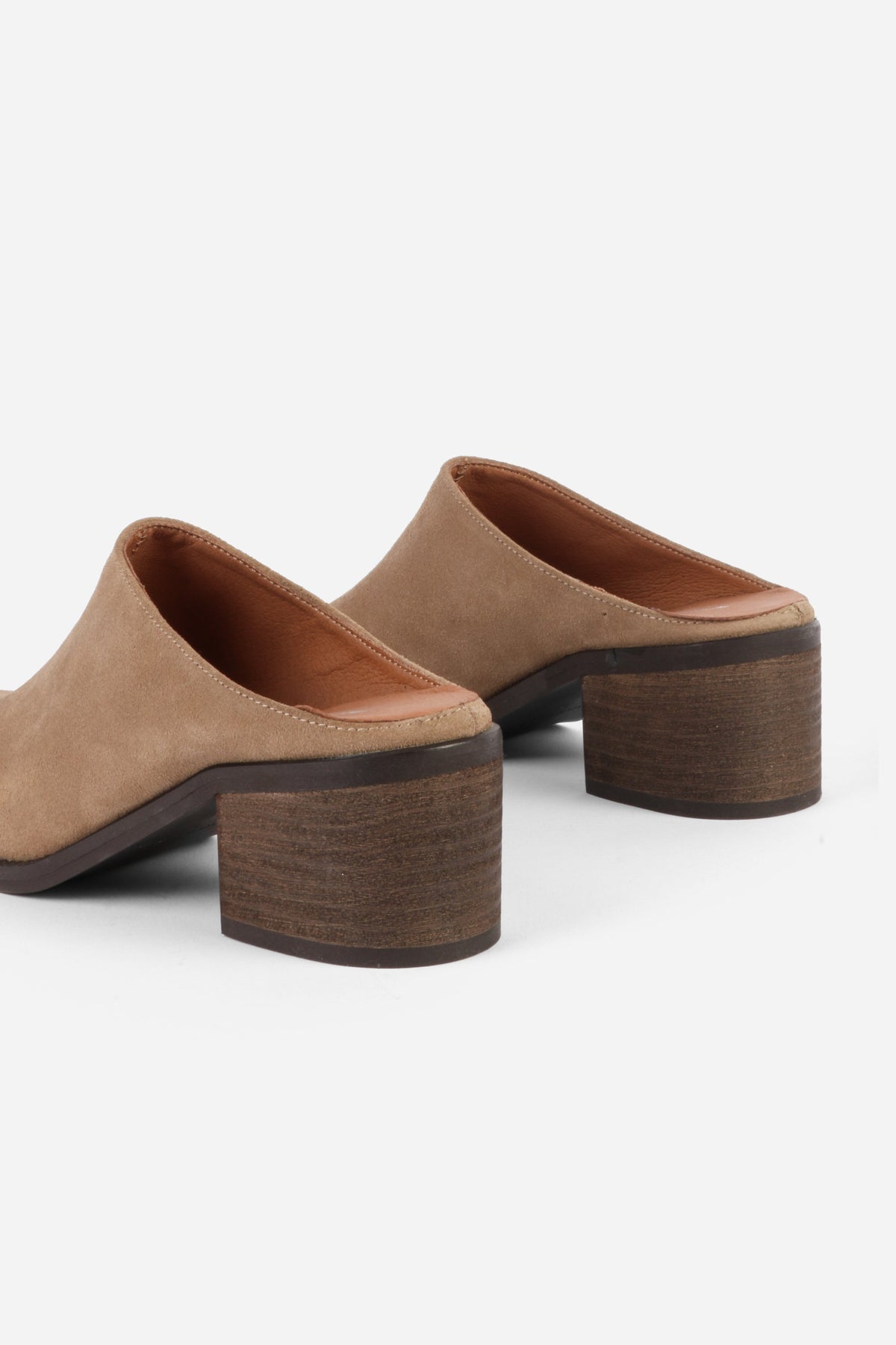 "INTENTIONALLY __________." Zelda Suede Heeled Mule