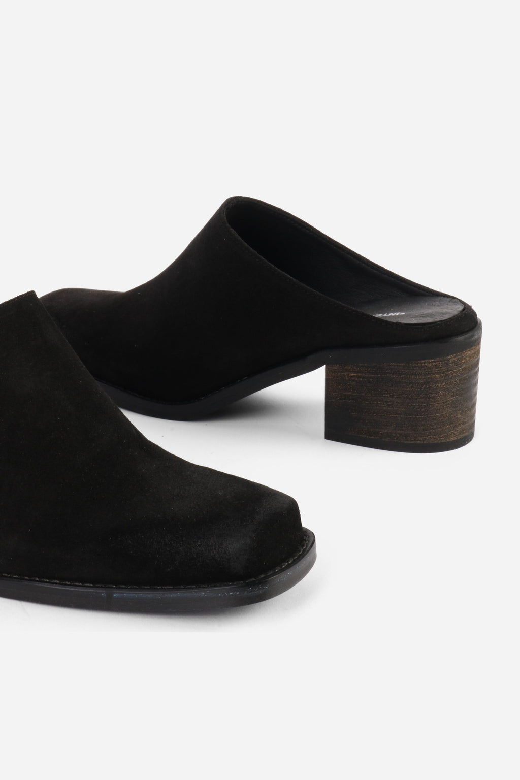 "INTENTIONALLY __________." Zelda Suede Heeled Mule